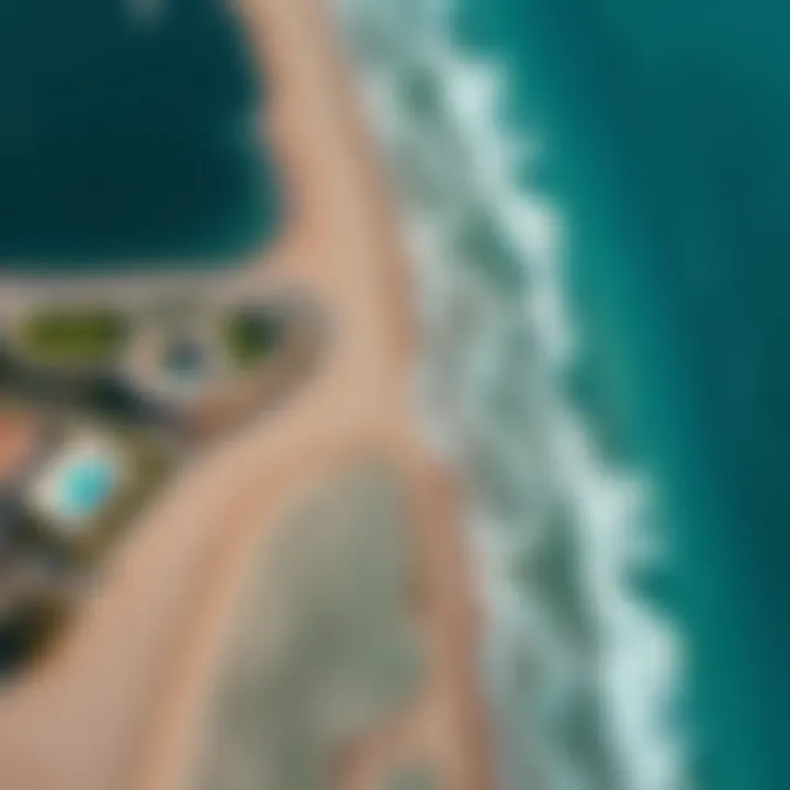 Aerial view showcasing the pristine coastline of Hudairiyat Beach