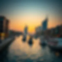 A serene view of Dubai Creek at sunset with boats